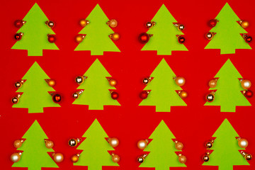 Christmas pattern of holiday decorations on red background