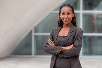 Cheerful smiling businesswoman portrait, happy african american corporate executive at work - 299035673