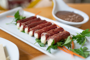 sausages with vegetables on plate