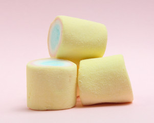 colorful marshmallows candy  on pink background