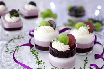 Homemade autumn glass desserts with grapes