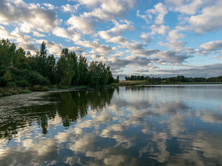 landscape with beautiful cloud reflections of lake water, calm water surface
