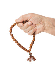 Hand with prayer beads