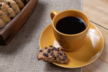 cup of homemade flavored chocolate chip cookies early in the morning