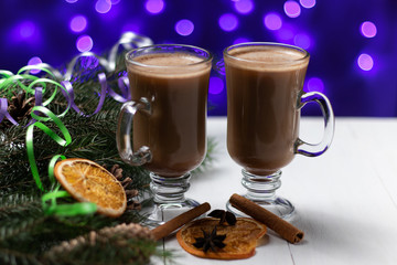 two cups hot drink cappuccino cocoa winter atmosphere air holiday lights new year bokeh blur cinnamon