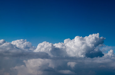 Naklejka na ściany i meble Above the clouds aerial view
