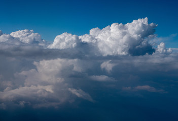 Fototapeta na wymiar Above the clouds, aerial view