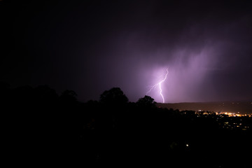 Naklejka na ściany i meble Nature putting on a show of strength with a massive lightning show