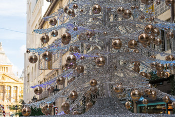 Christmas souvenirs on the counter in Europe, Painted glass Christmas balls with fairy tales.