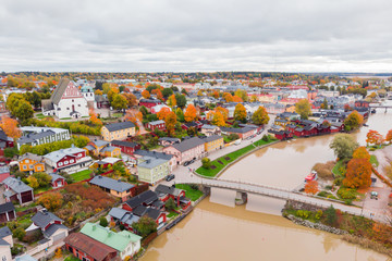 Aerial autumn view of Old town of Porvoo, Finland. Beautiful city landscape with idyllic river...