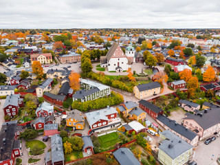 Aerial autumn view of Old town of Porvoo, Finland. Beautiful city landscape with idyllic river...