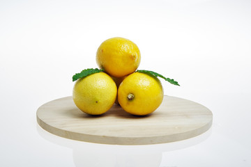 Yellow lemons on white background, isolated