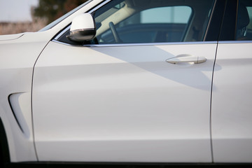 New White SUV, car details closeup in outdoor