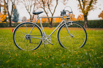 Fototapeta na wymiar Vintage city bike in silver color