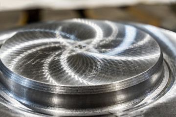 The polished part of the machined surface of a round metal part.