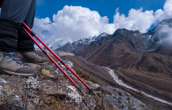 Hiker hiking at stone path in Khumbu valley , Ama Dablam mount area
