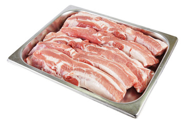 A few pieces of fresh pork in a metal tray