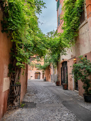 Fototapeta na wymiar Small narrow streets in Trastevere, Rome Italy