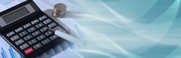 Calculator on financial documents, accounting concept; panoramic banner