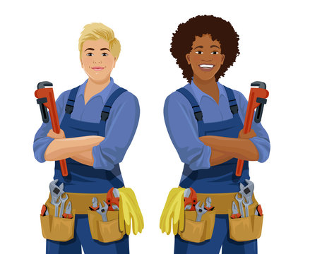 Set of European and African American female workers with tools. Cartoon smiling women plumbers, locksmiths, mechanics. Vector illustration isolated on the white background