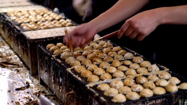 Cooking takoyaki ball in Thailand