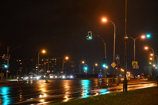 Vilnius, Lithuania-28 oct,2019: Vilnius at night. Street schene with traffic lights and cars on rainy night at Vilnius, capotal of Lithuania, Baltic country