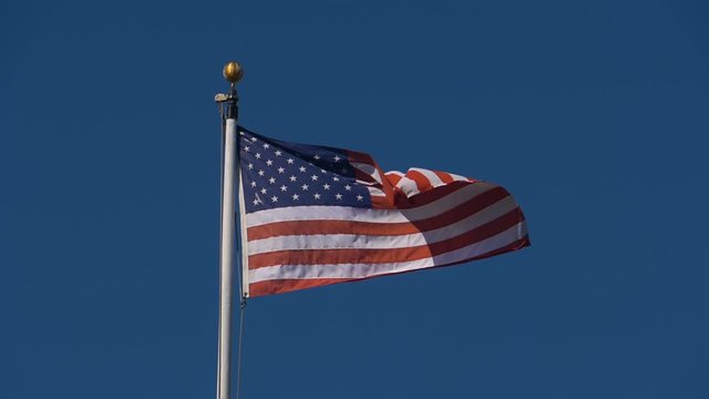 US Flag Strong Breeze Slow Motion 180fps Blue Sky Background