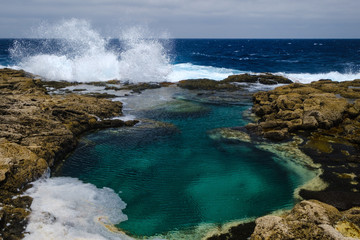 Los Charcones area with beautiful green and blue pools of sea water