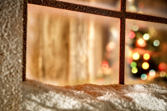 Winter window sill of snow and chrsitmas home interior 