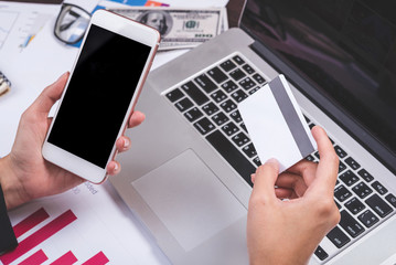 businesswoman enjoy shopping online with laptop and credit card at office.
