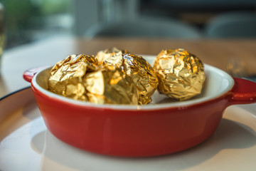 Beef balls wrapped in golden tin paper