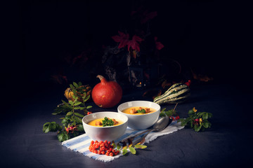 Delicious pumpkin soup with croutons and coconut milk