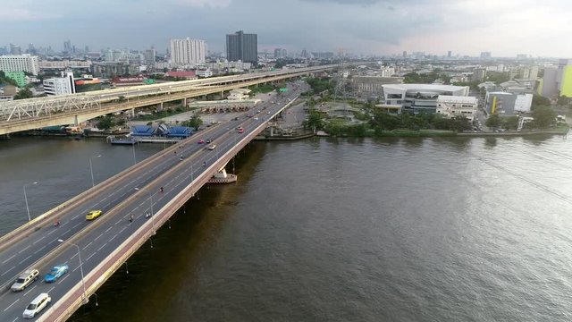 Thailand bridge aerial view flyover with colorful and moving traffic