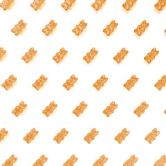 Jelly gummy bears. Jelly bear orange fruit. Jelly gummy orange fruits isolated on white background