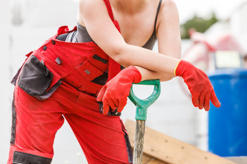Woman worker with shovel