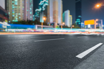 Empty asphalt road through modern city in Shanghai, China.