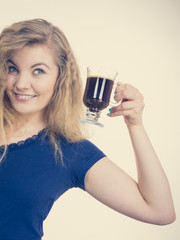 Positive woman drinking her morning coffee