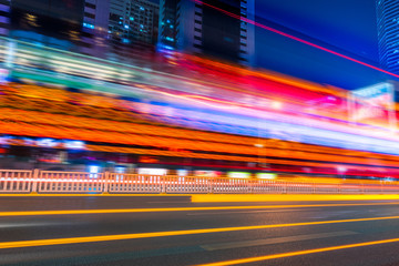 traffic with blur light through city at night.