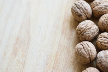 Walnut background. For articles about the garden, autumn harvest. Copy space. Free space for note and text.