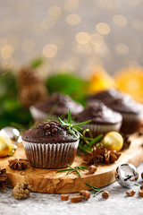 Christmas muffins. Chocolate Xmas or Noel festive bake with decorations and fir tree
