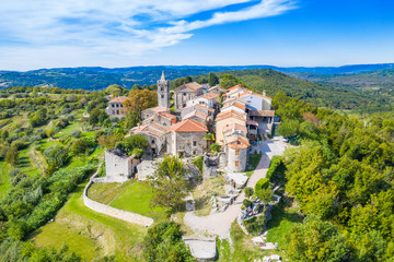 Beautiful old town of Hum on the hill, traditional architecture in Istria, Croatia, aerial view from drone © ilijaa