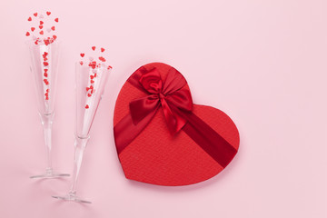 Champagne glasses and heart shaped sweets holiday