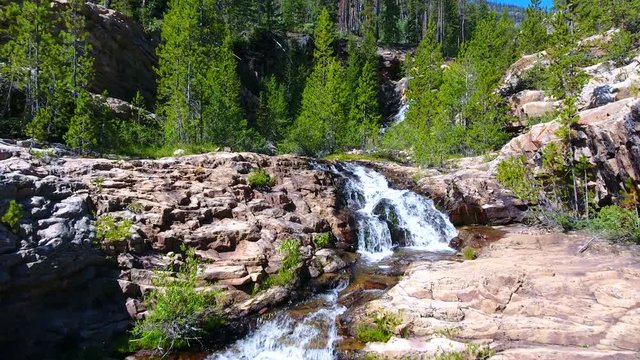 Traveling up stream with a DJI Fantom capturing a beautiful river falling over the rocks.