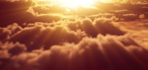 Naklejka na ściany i meble above clouds sunset god ray