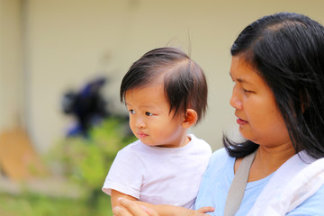 Asian boy with mother. Mother and son.