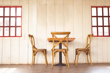 Asian style cafe with wooden table and chairs