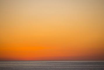The sun rises over the sea, dawn in Sicily
