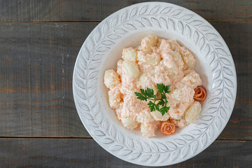 Potatoes Gnocchi with cheese and salmon.