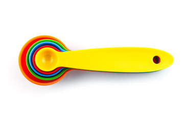 a set of measuring spoon of plastic on white background.