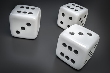Set of white dice with black dots isolated on black background